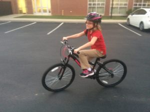 Laura riding on her bike